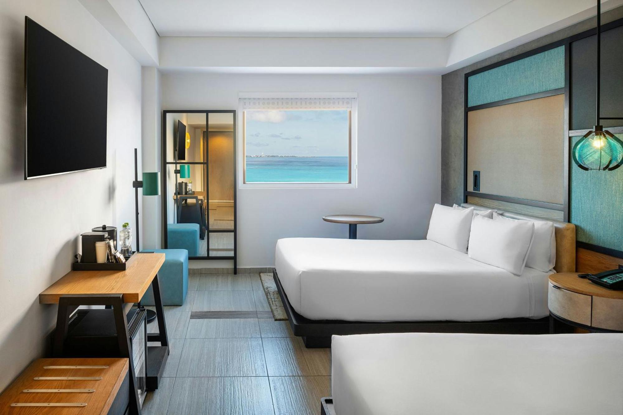 Aloft Ocean View Guest room 2 Queen Complimentary open bar