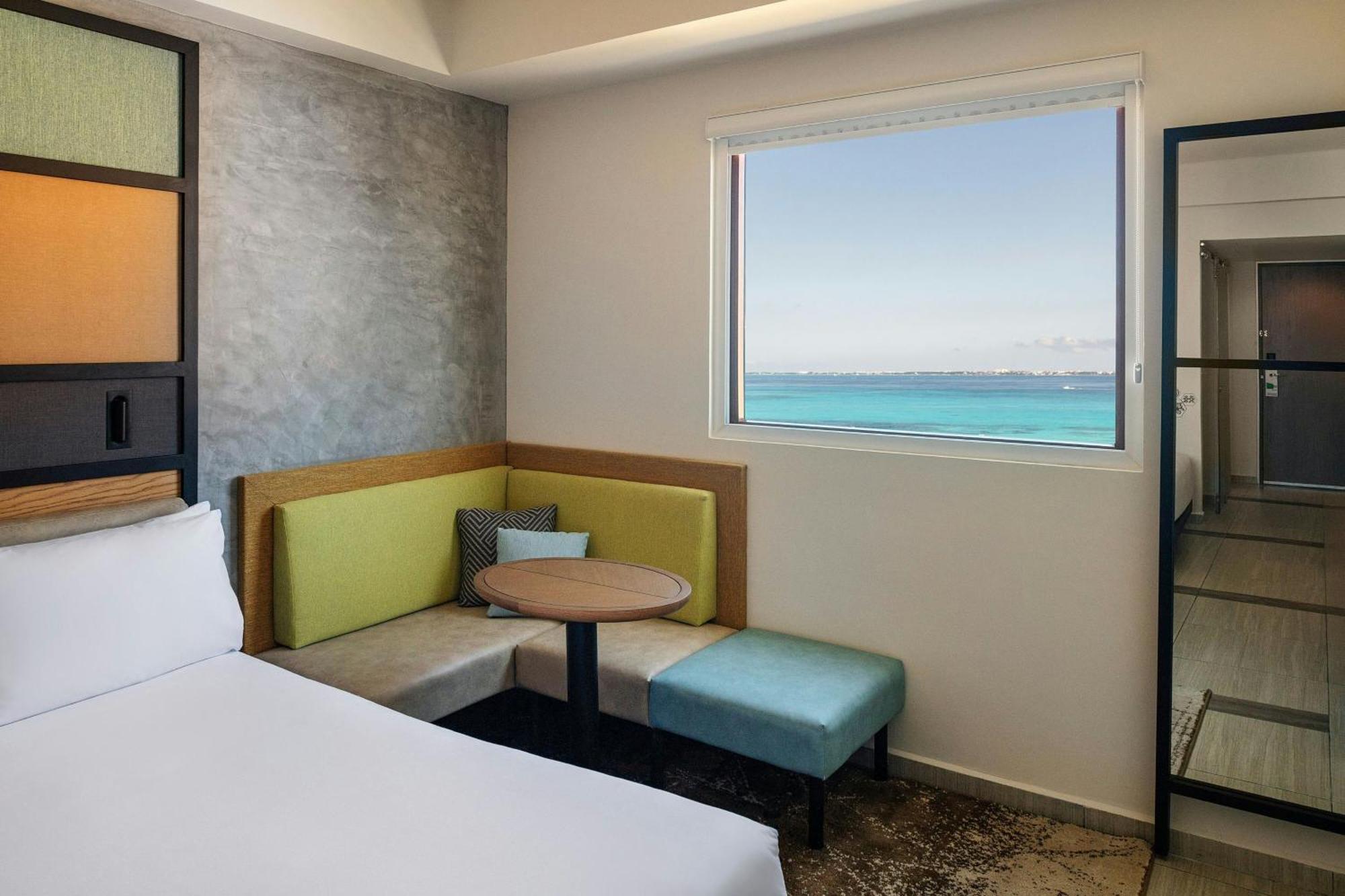 Aloft Ocean View Guest room 2 Queen Complimentary open bar